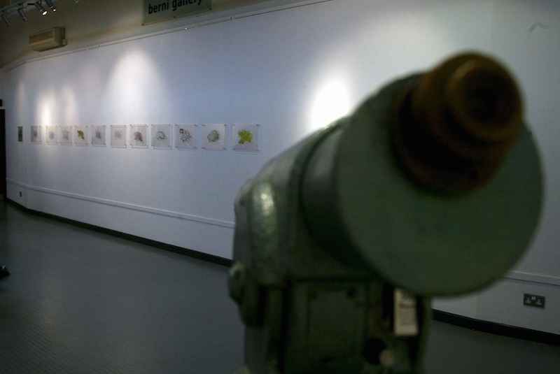 Installation of telescope and maps from "Retrospection - the art of looking backwards". An exhibition to commemorate 800 years of Jersey's independence.